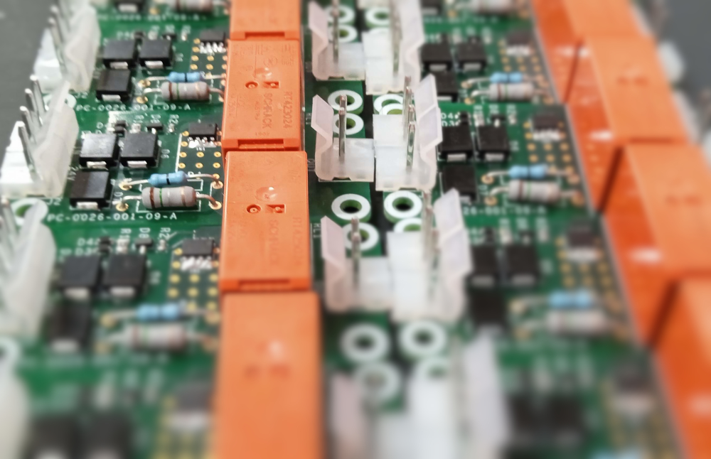 Close up of printed circuit board showing various electronic components