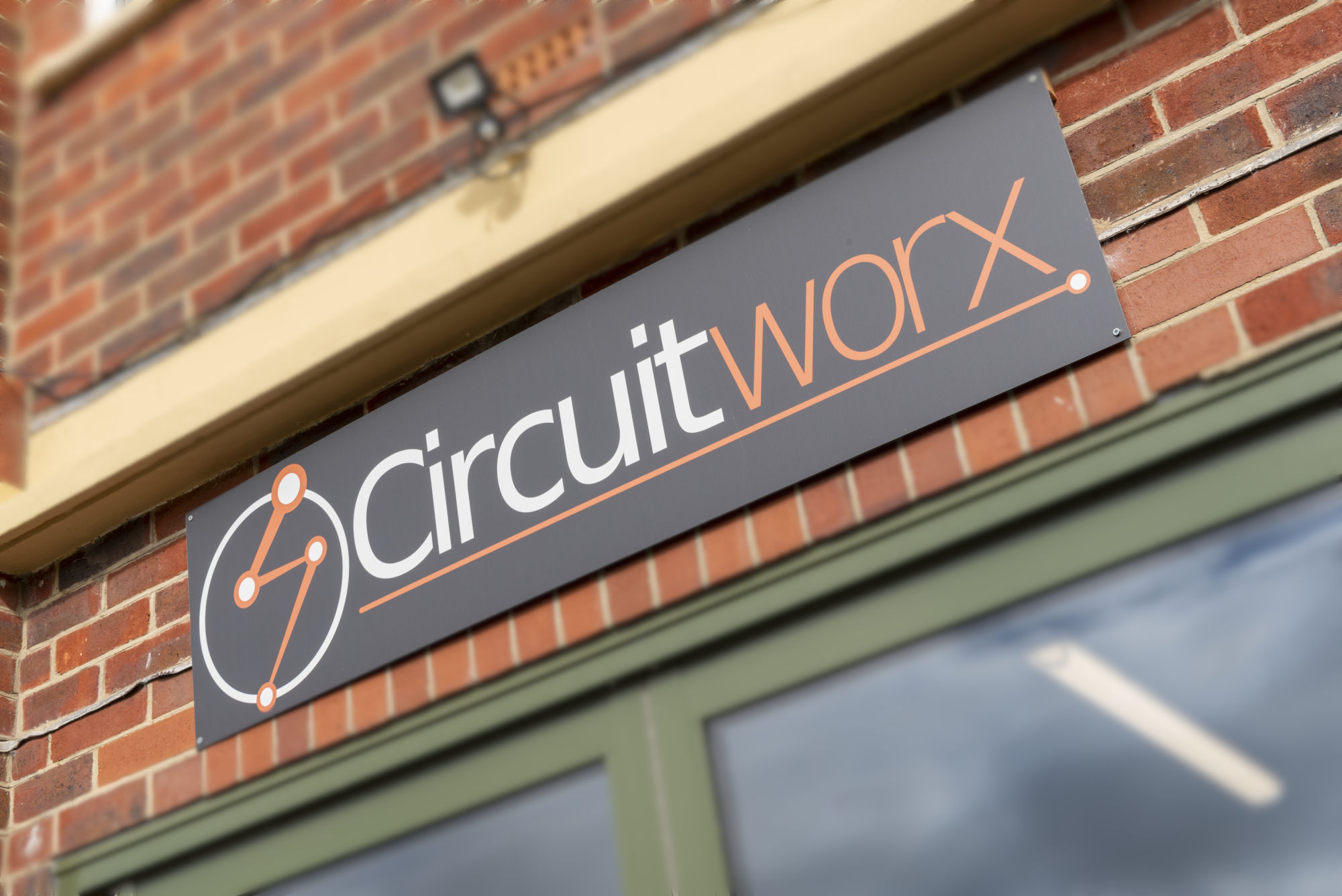 CircuitWorx sign on brick wall of building