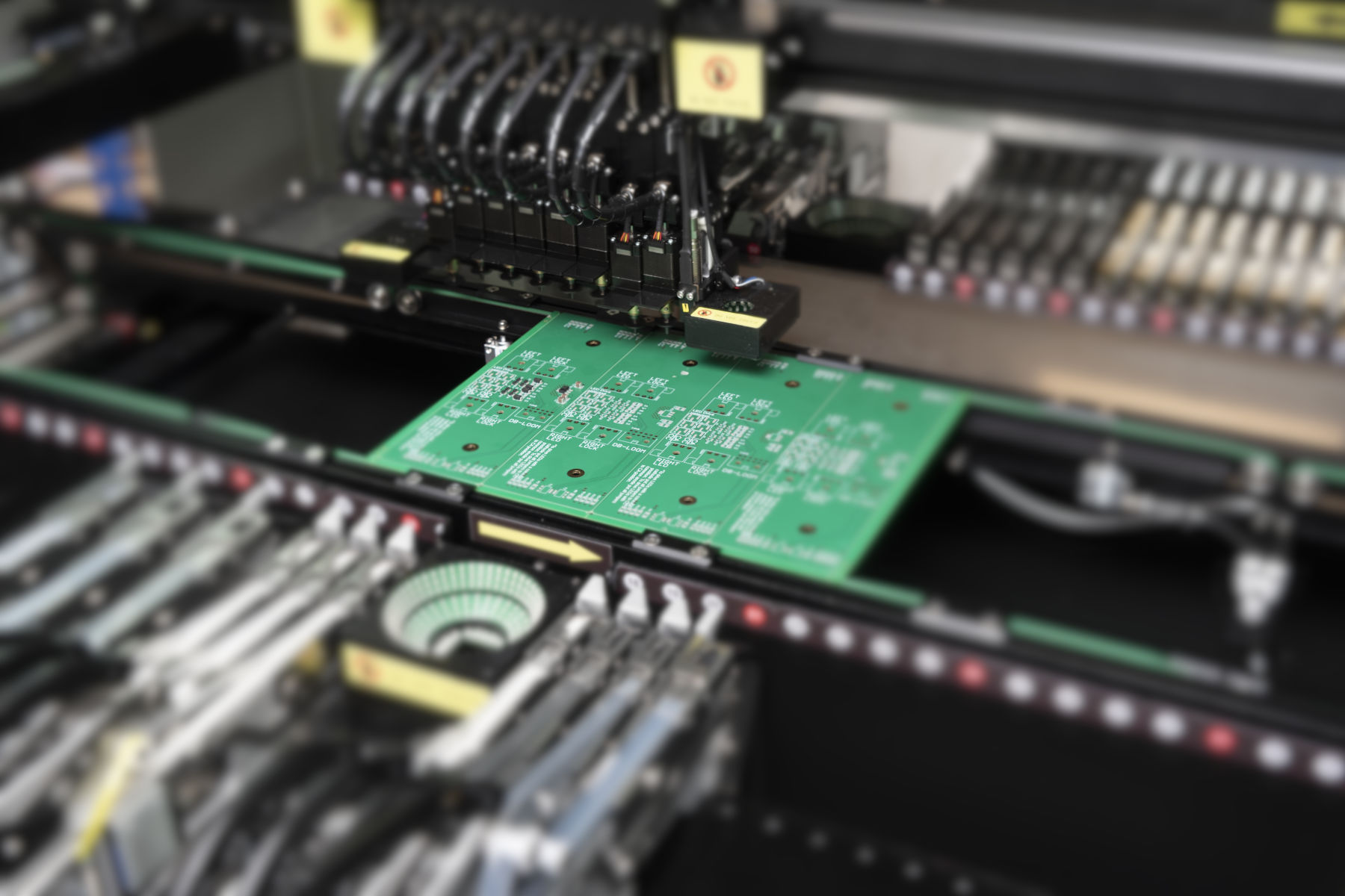 PCB assembly pick and place machine in action